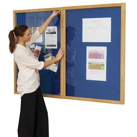 Lockable felt notice board - Double door with wood frame - Oxford Blue