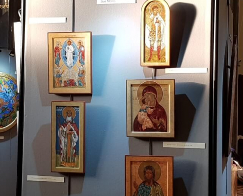 Picture hooks and lighting for display boards