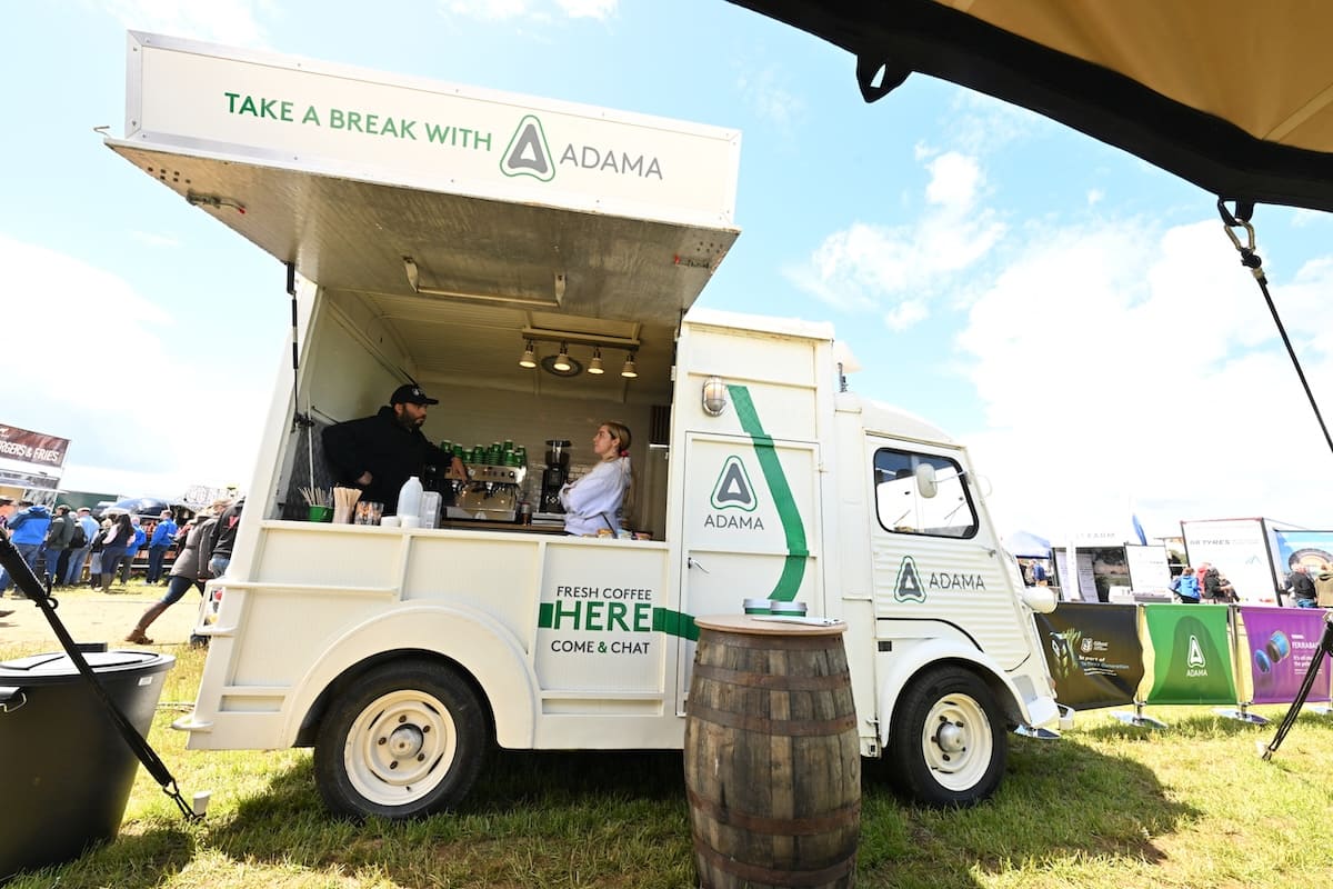 adama-branded-coffee-van-cereals-2026 ADAMA branded vintage coffee van serving visitors at Cereals 2026.