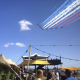 HEXIS Sky Lounge hospitality structure at an outdoor event with aerial display viewing