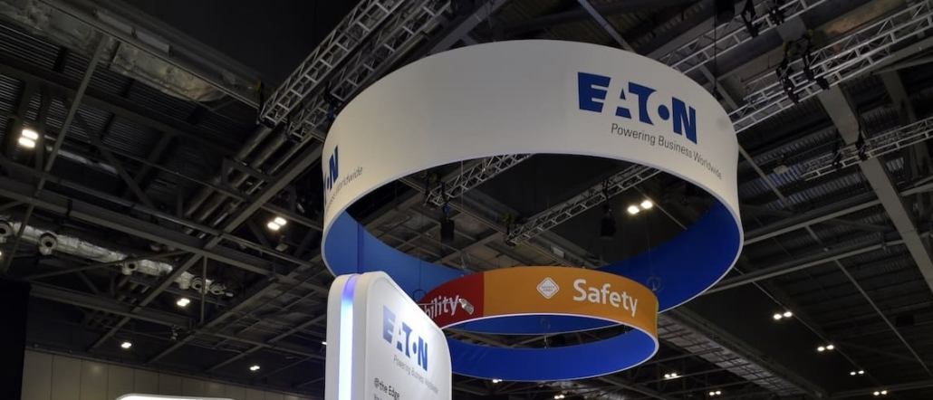 Eaton exhibition stand – hanging ring detail Close-up of Eaton exhibition stand's hanging circular rig signage with rotating messages